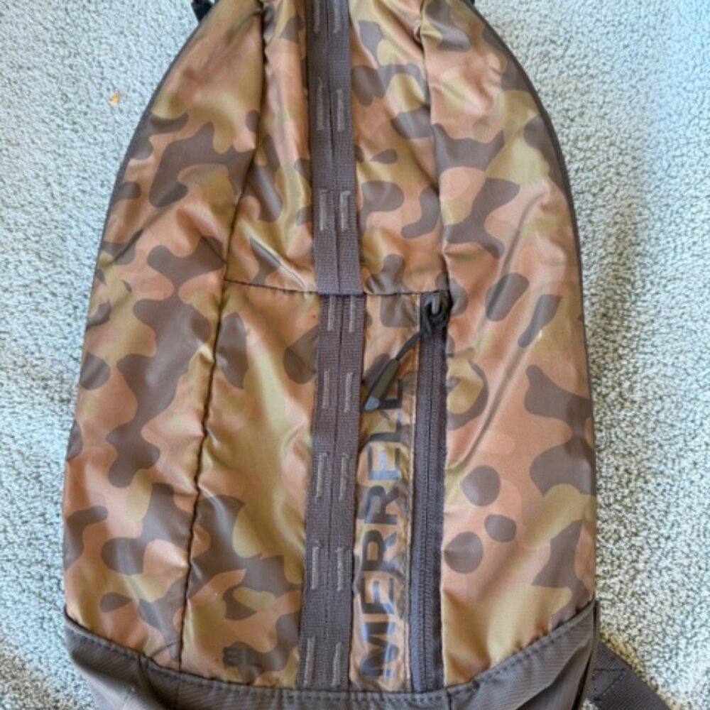 Both Merrell Crest 8L Sling Bags (one blue, one camo), both very nice!